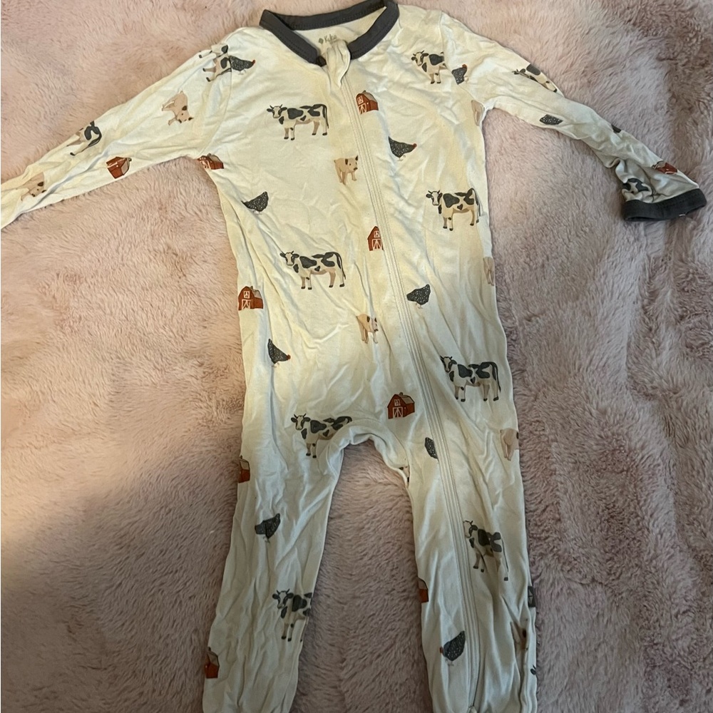 Kyte BABY Cream Cow Print Footie